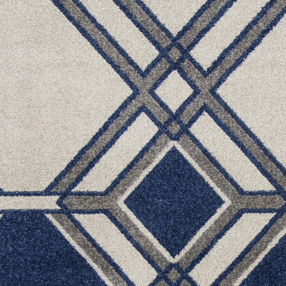 7' X 10' Ivory and Blue Geometric Indoor Outdoor Area Rug