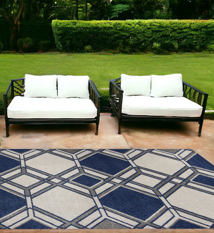 7' X 10' Ivory and Blue Geometric Indoor Outdoor Area Rug