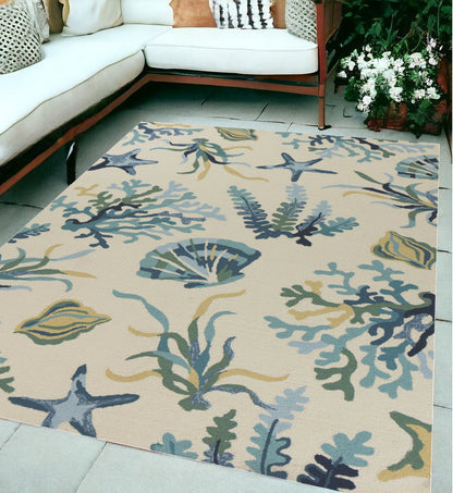 5' X 8' Ivory and Blue Floral Handmade Indoor Outdoor Area Rug