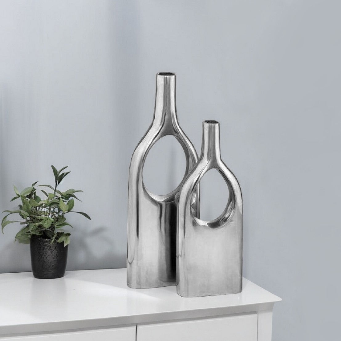 Set of Two Silver Aluminum Modern Hole Table Vases