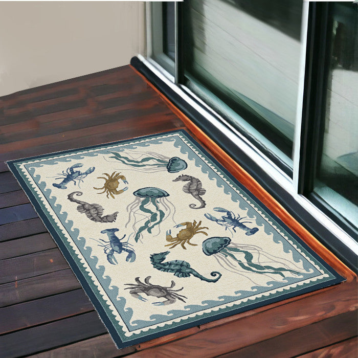 5' X 7' Ivory Or Teal Sea Creatures Indoor Outdoor Area Rug