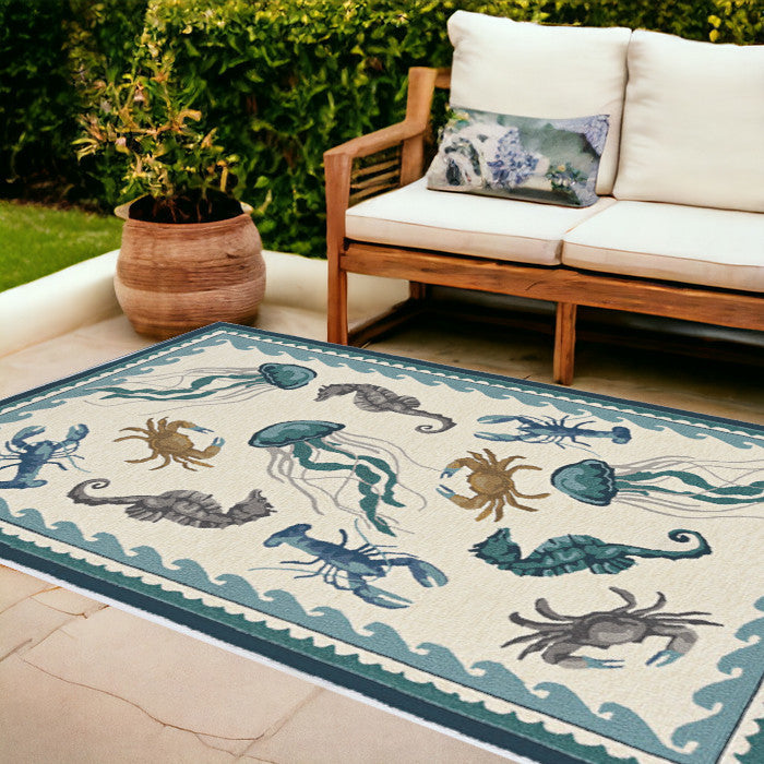 5' X 7' Ivory Or Teal Sea Creatures Indoor Outdoor Area Rug