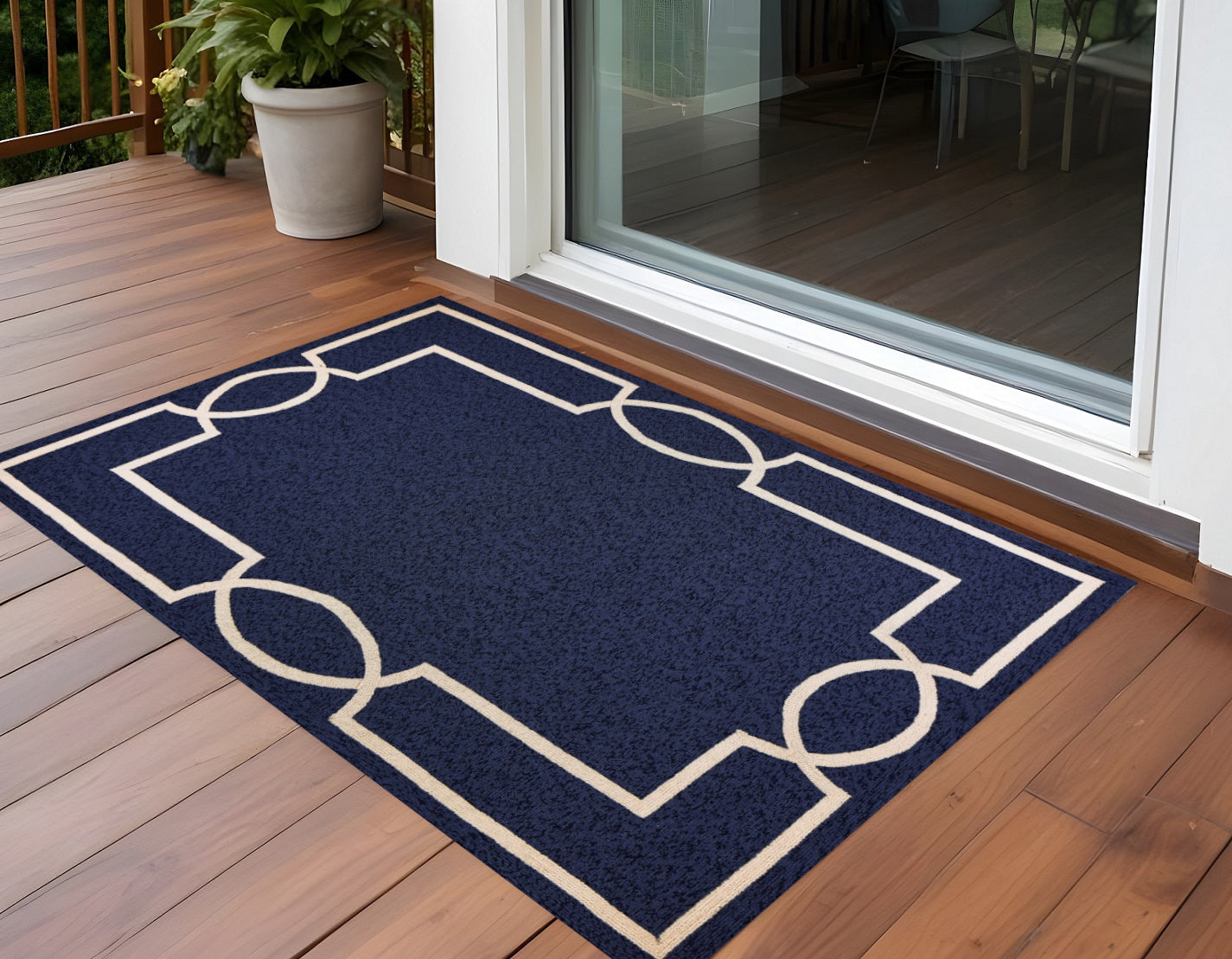 5' X 7' Blue and Ivory Handmade Indoor Outdoor Area Rug