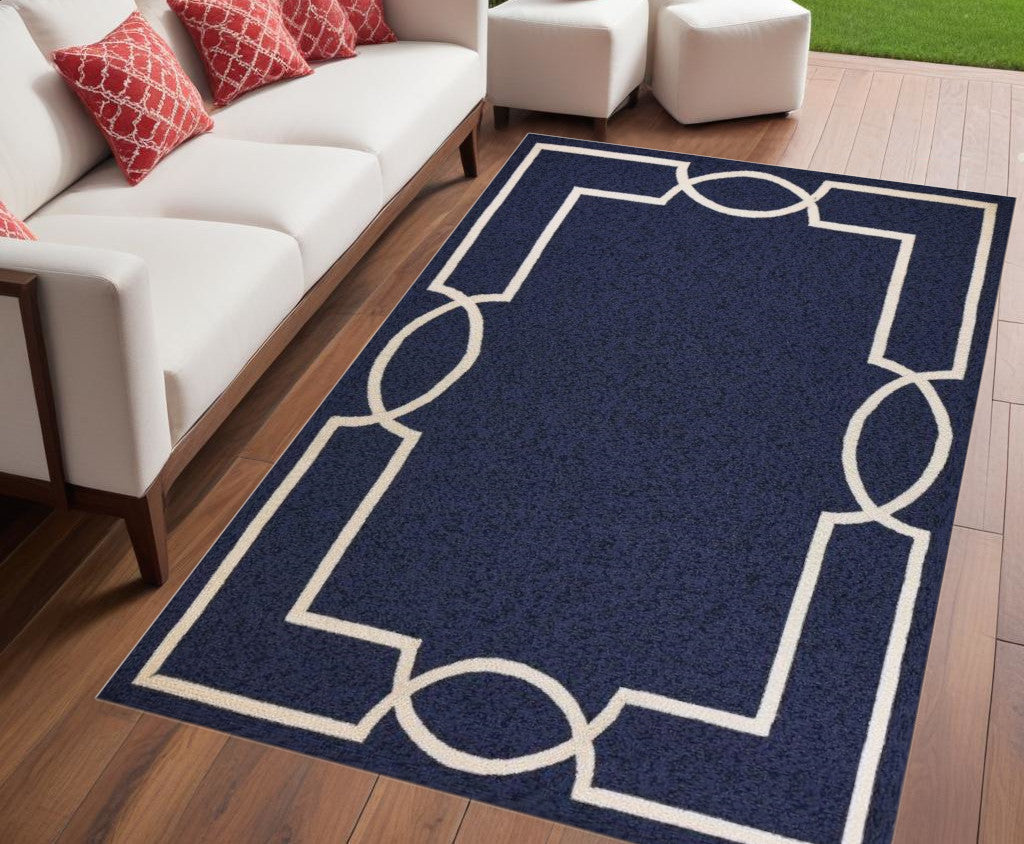 5' X 7' Blue and Ivory Handmade Indoor Outdoor Area Rug