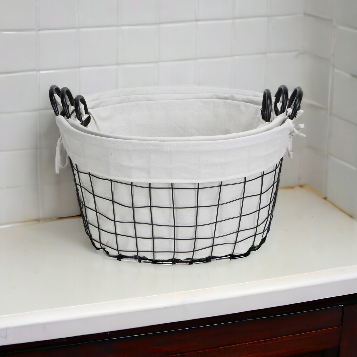 Set Of Three Black Oval Wire Baskets with White Fabric Liners and Handles