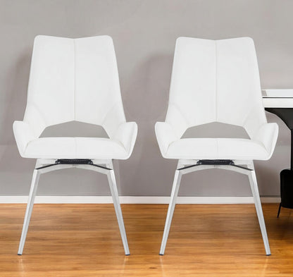 Set of Two Tufted White And Silver Upholstered Faux Leather Dining Arm Chairs