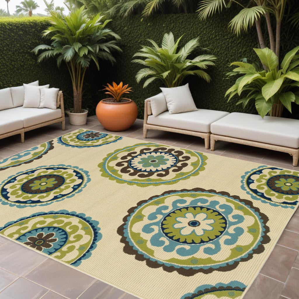 7' X 10' Green and Ivory Floral Indoor Outdoor Area Rug