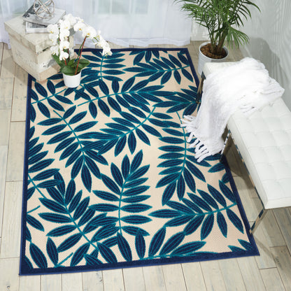 7' X 10' Blue And Ivory Floral Stain Resistant Indoor Outdoor Area Rug