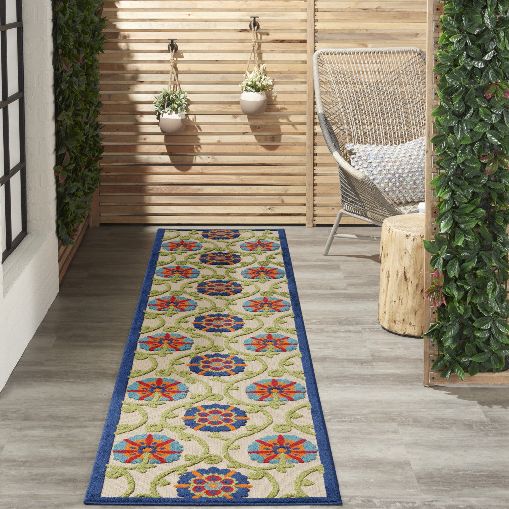 6' X 9' Ivory And Blue Floral Indoor Outdoor Area Rug