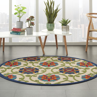 6' X 9' Ivory And Blue Floral Indoor Outdoor Area Rug