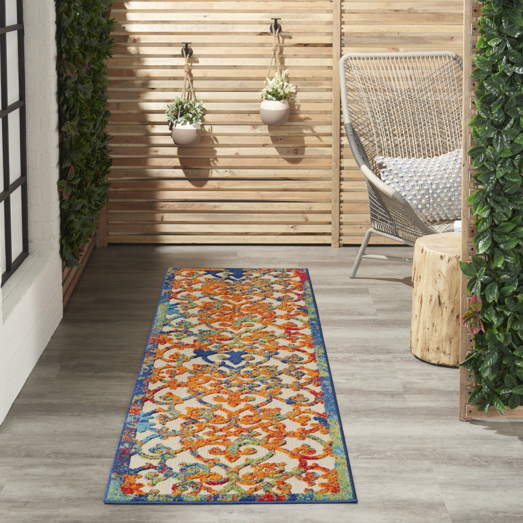 2' X 6' Ivory And Blue Floral Indoor Outdoor Area Rug