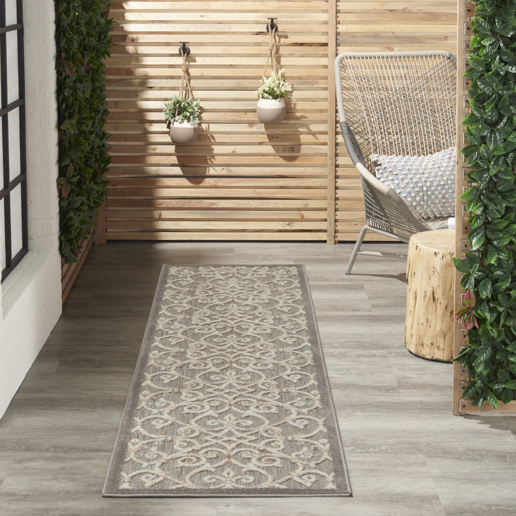 2' X 10' Gray And Ivory Floral Indoor Outdoor Area Rug