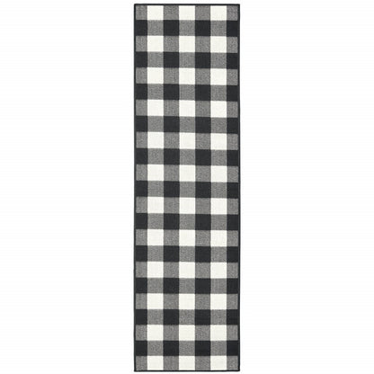 2' X 8' Black and Ivory Indoor Outdoor Area Rug