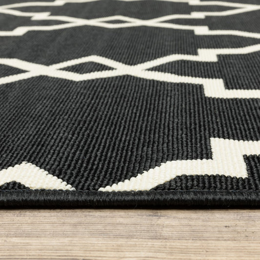 2' X 8' Black and Ivory Indoor Outdoor Area Rug