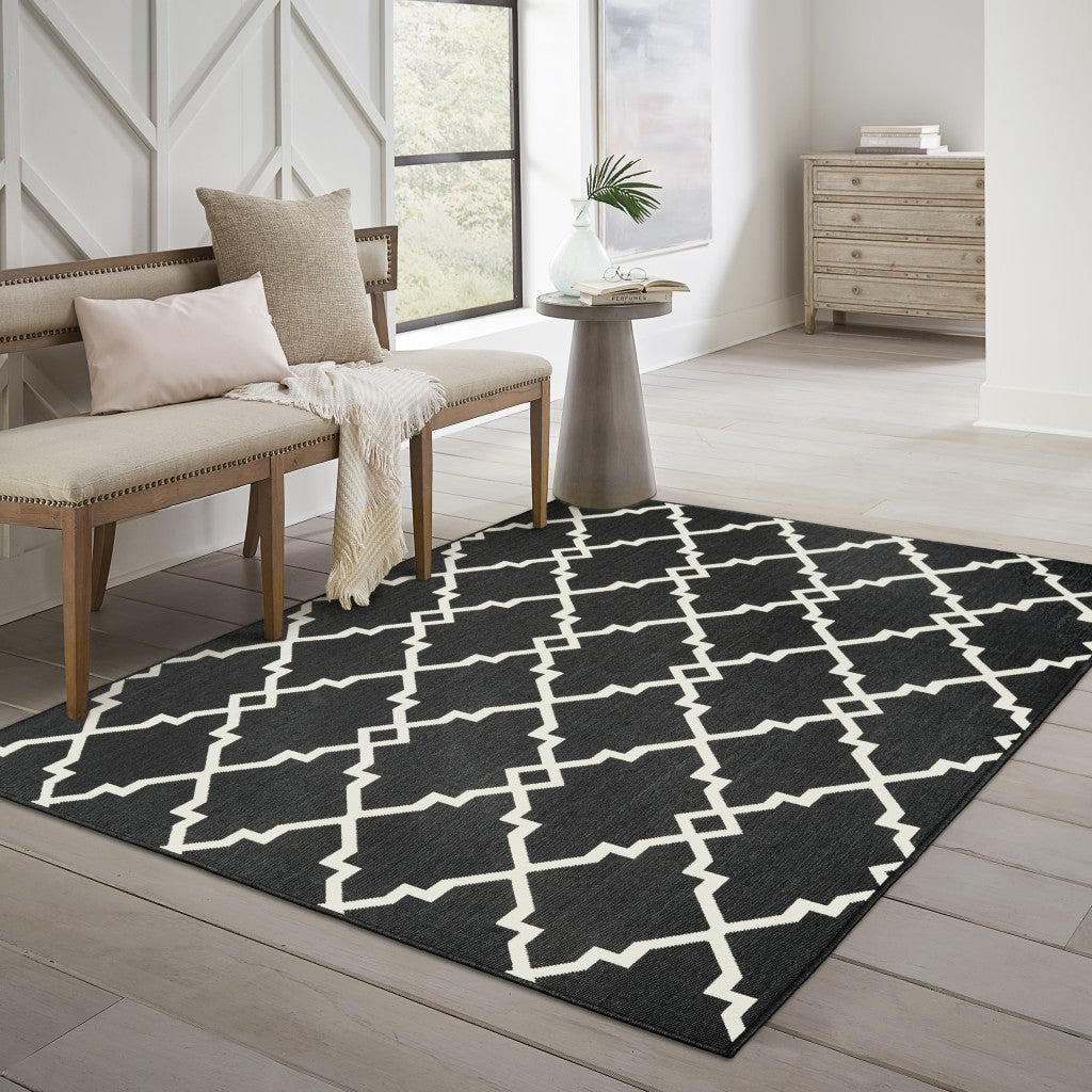 8' X 11' Black and Ivory Indoor Outdoor Area Rug