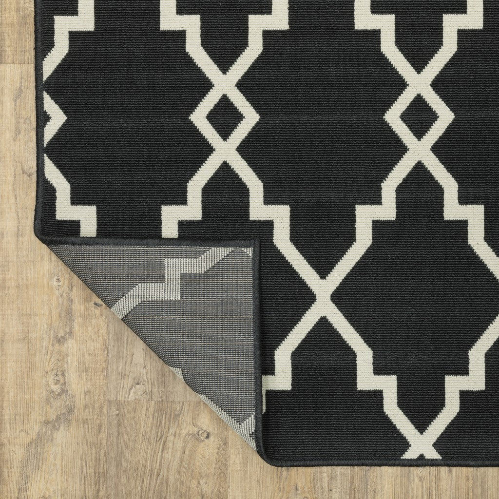 8' X 11' Black and Ivory Indoor Outdoor Area Rug