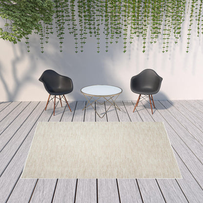 7' X 10' Ivory And Beige Non Skid Indoor Outdoor Area Rug