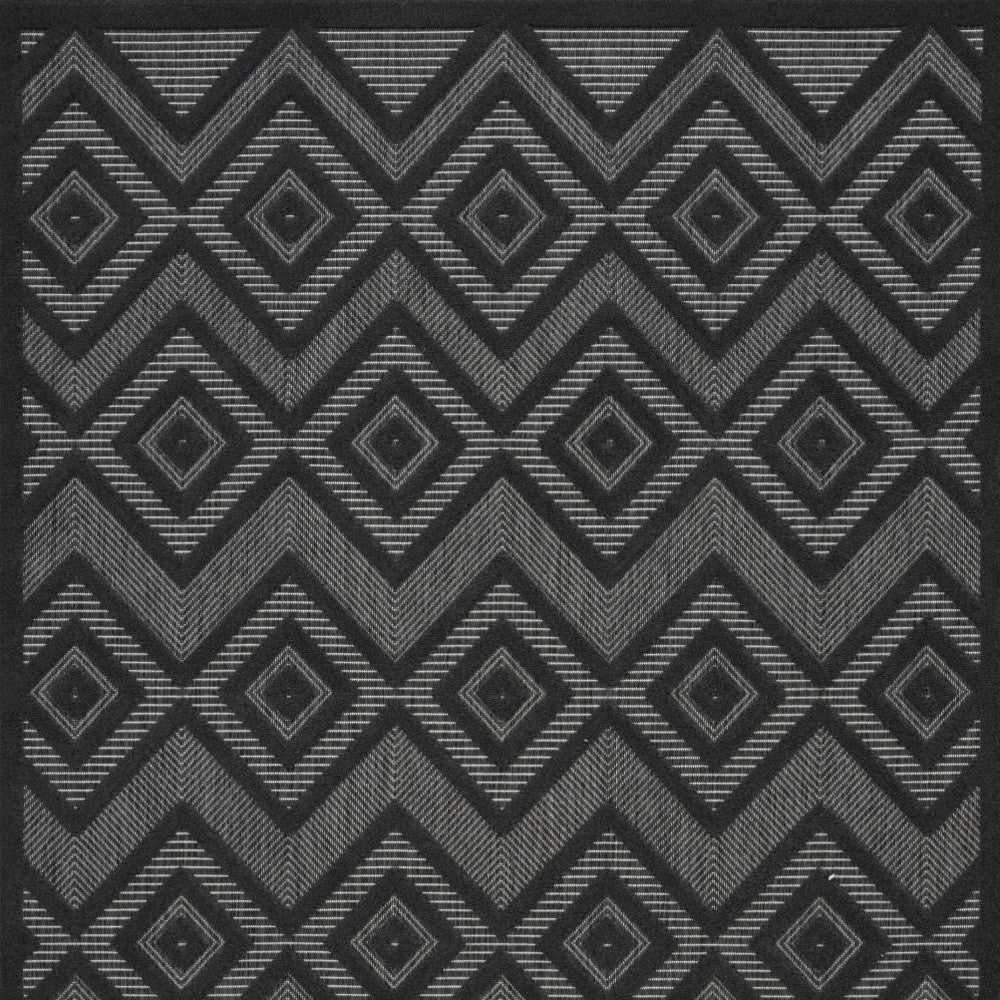 6' X 9' Charcoal Black Argyle Indoor Outdoor Area Rug