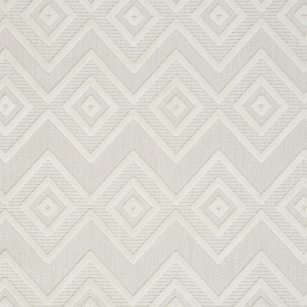 5' X 7' Ivory And White Argyle Indoor Outdoor Area Rug