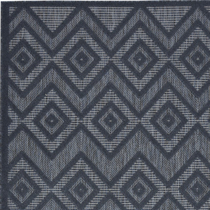 5' X 7' Navy Blue Argyle Indoor Outdoor Area Rug