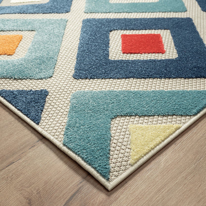 5' X 8' Blue And Ivory Geometric Stain Resistant Indoor Outdoor Area Rug