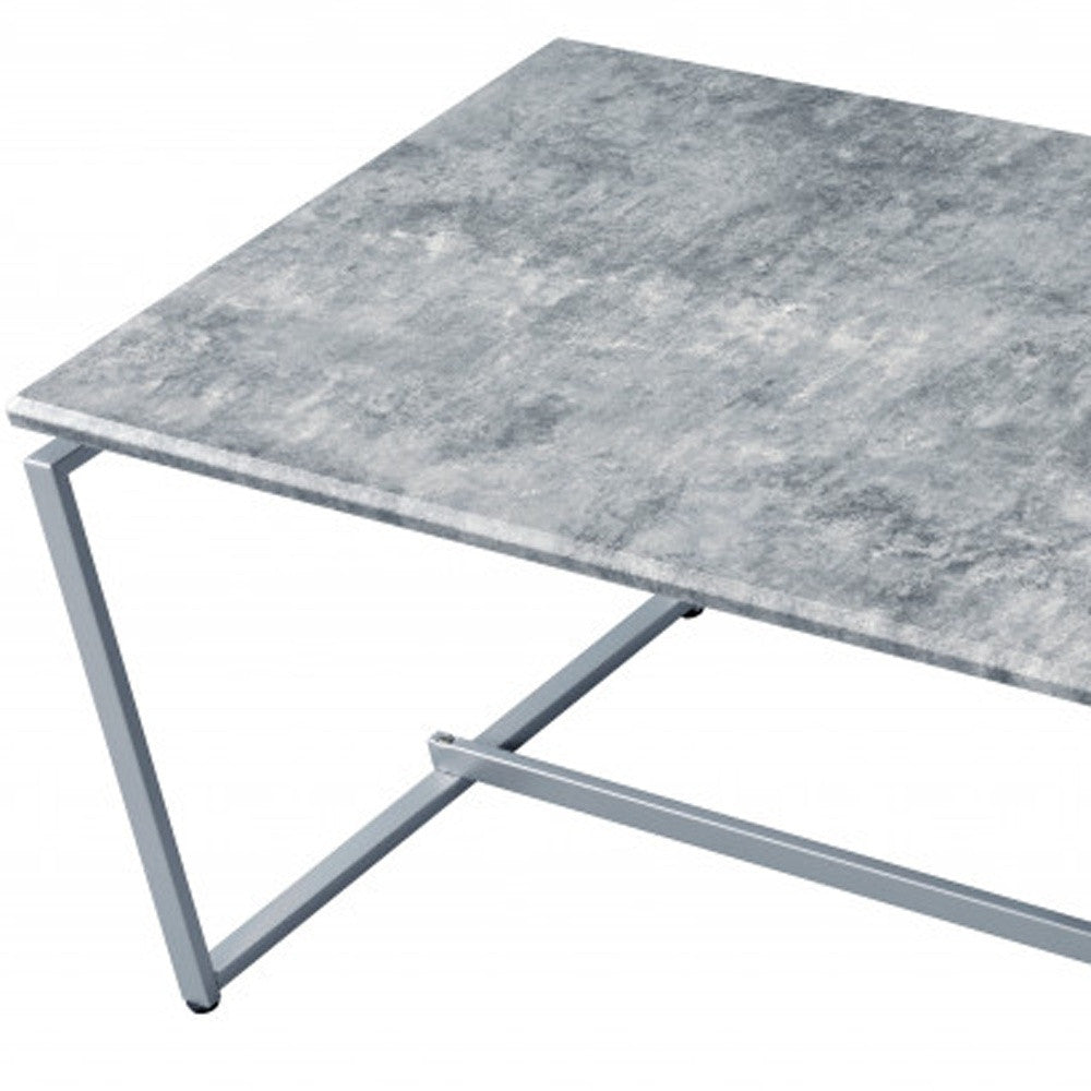 47" Silver And Faux Concrete Pvc Veneer Rectangular Coffee Table