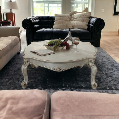 54" Pearl Solid And Manufactured Wood And Polyresin Coffee Table