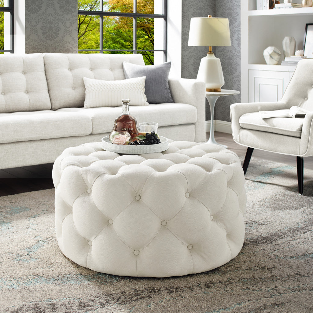 33" White Linen Rolling Tufted Round Cocktail Ottoman