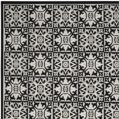 7' X 10' Black And White Fleur De Lis Stain Resistant Non Skid Area Rug