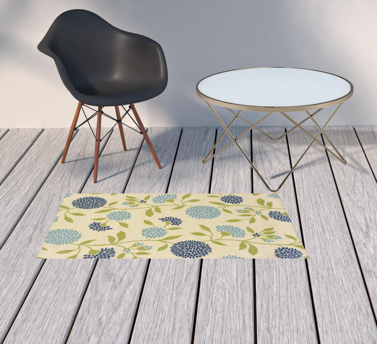 2' X 4' Green and Ivory Floral Stain Resistant Indoor Outdoor Area Rug