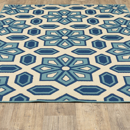 4' X 6' Ivory and Blue Geometric Stain Resistant Indoor Outdoor Area Rug