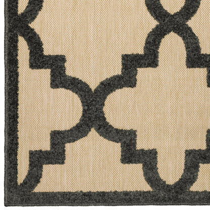 2' X 8' Beige and Black Geometric Stain Resistant Indoor Outdoor Area Rug