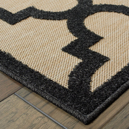 4' X 5' Beige and Black Geometric Stain Resistant Indoor Outdoor Area Rug