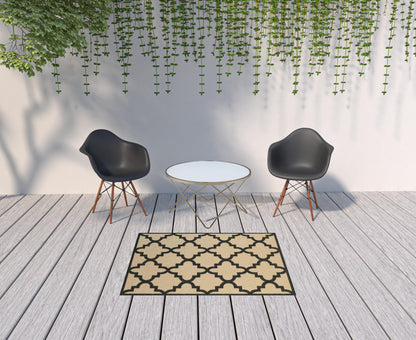 4' X 5' Beige and Black Geometric Stain Resistant Indoor Outdoor Area Rug