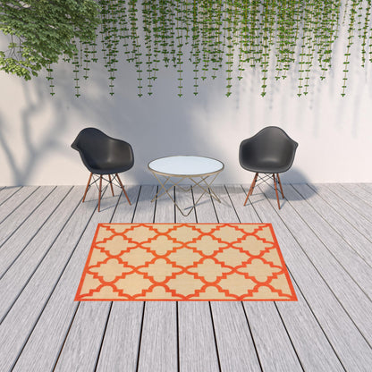 5' X 8' Orange Geometric Stain Resistant Indoor Outdoor Area Rug