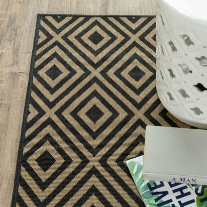 2' X 4' Black and Tan Geometric Stain Resistant Indoor Outdoor Area Rug