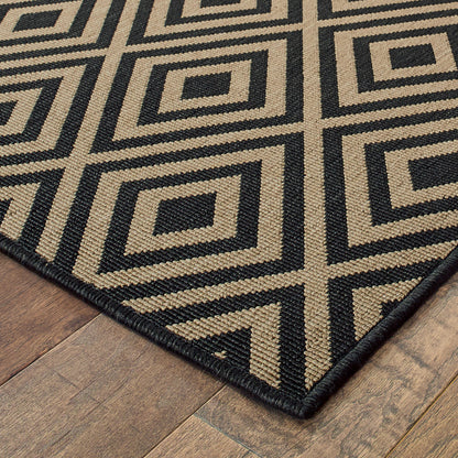 2' X 8' Black and Tan Geometric Stain Resistant Indoor Outdoor Area Rug