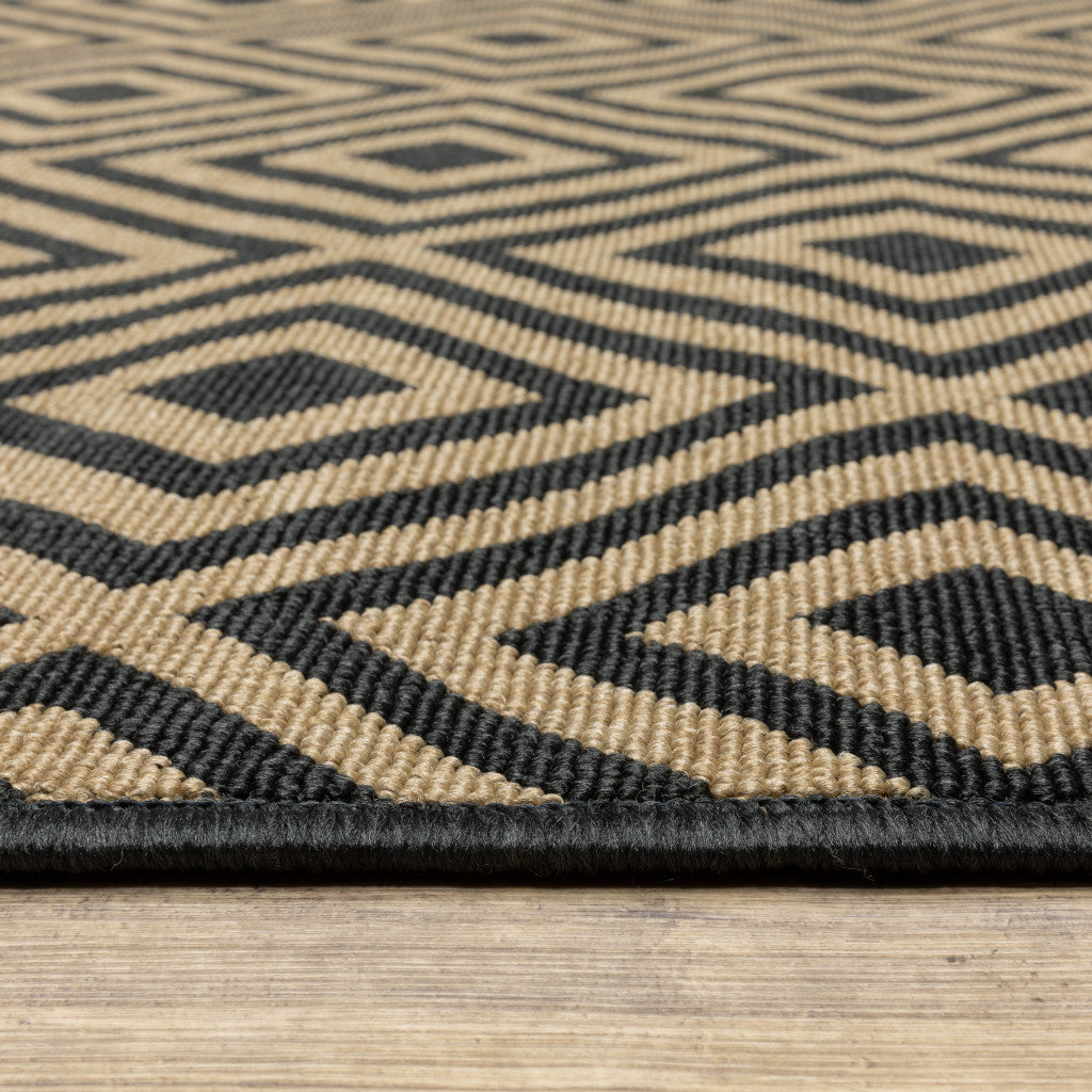 7' X 10' Black and Tan Geometric Stain Resistant Indoor Outdoor Area Rug