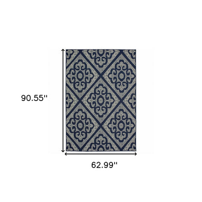 5' X 8' Blue and Ivory Geometric Stain Resistant Indoor Outdoor Area Rug