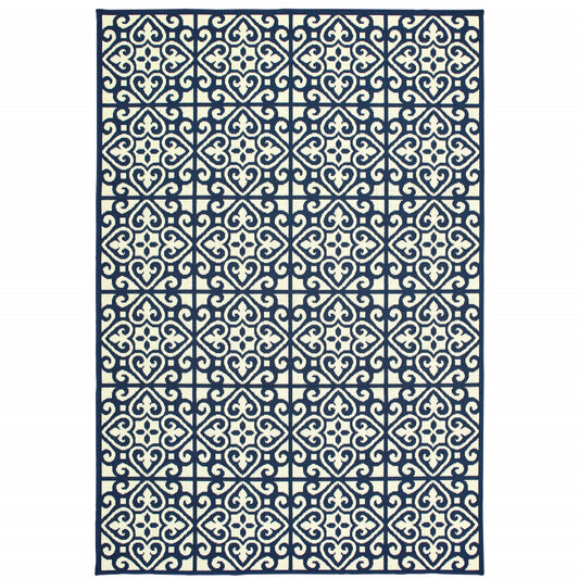 2' X 4' Ivory and Blue Geometric Stain Resistant Indoor Outdoor Area Rug