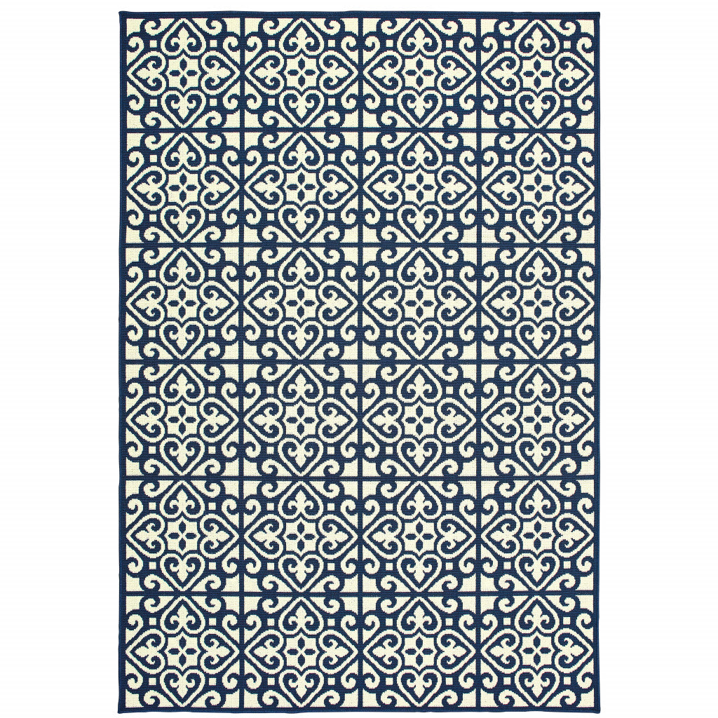 7' X 10' Ivory and Blue Geometric Stain Resistant Indoor Outdoor Area Rug