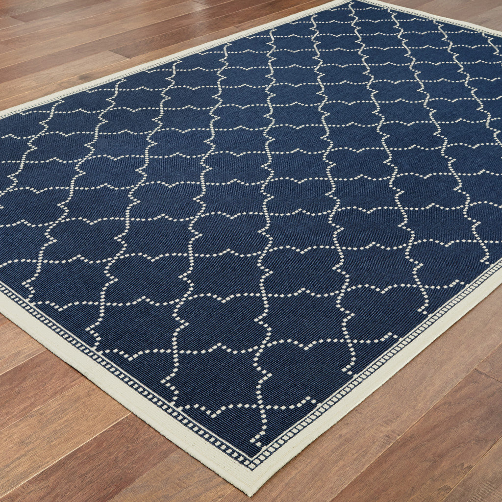 2' X 4' Blue and Ivory Geometric Stain Resistant Indoor Outdoor Area Rug