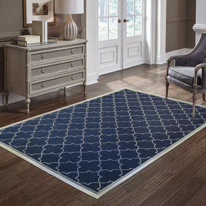 7' X 10' Blue and Ivory Geometric Stain Resistant Indoor Outdoor Area Rug