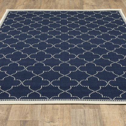 7' X 10' Blue and Ivory Geometric Stain Resistant Indoor Outdoor Area Rug