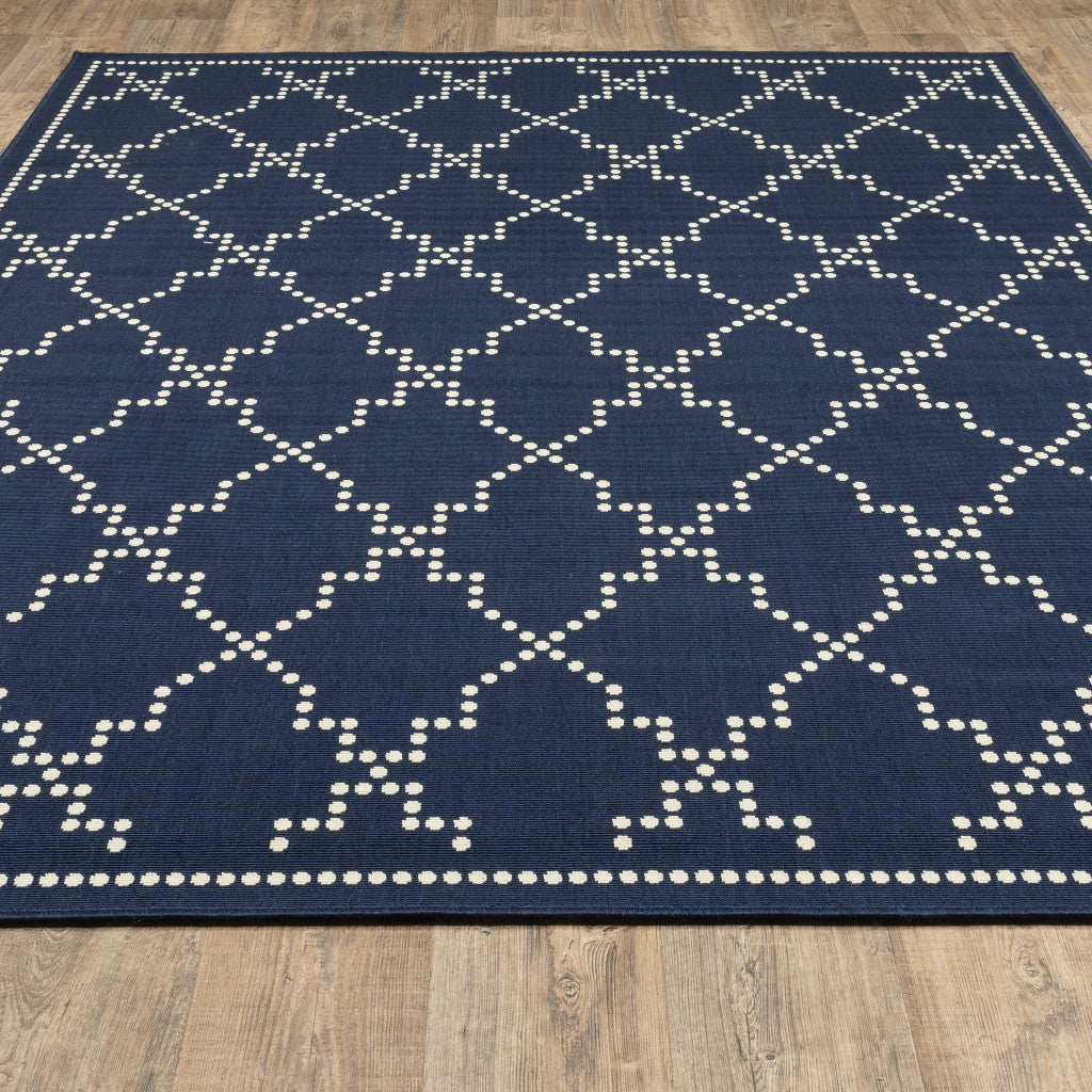 2' X 4' Blue and Ivory Geometric Stain Resistant Indoor Outdoor Area Rug