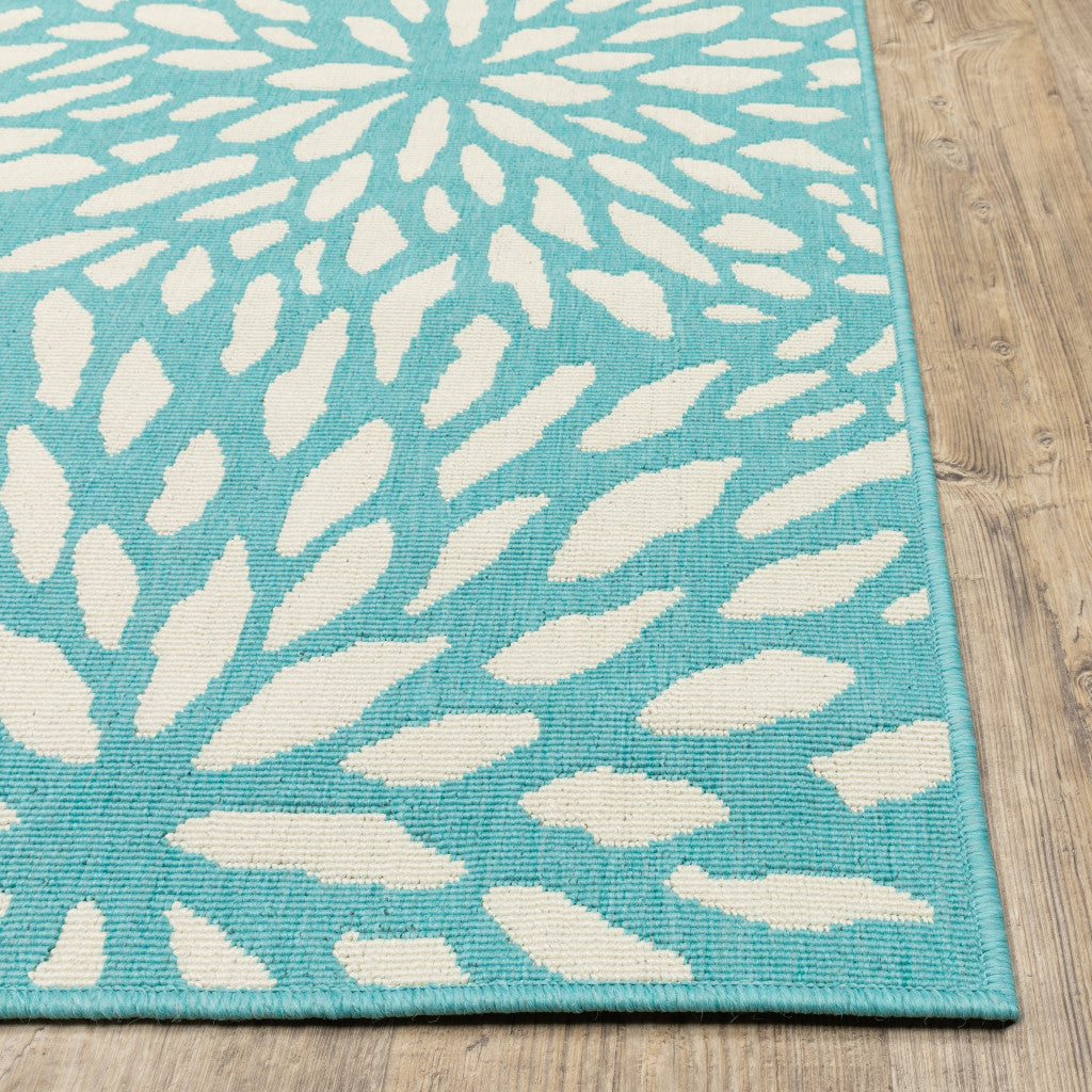 2' X 8' Blue and Ivory Floral Stain Resistant Indoor Outdoor Area Rug