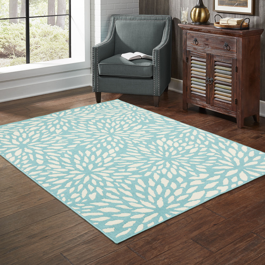 7' x 10' Blue and Ivory Floral Stain Resistant Indoor Outdoor Area Rug