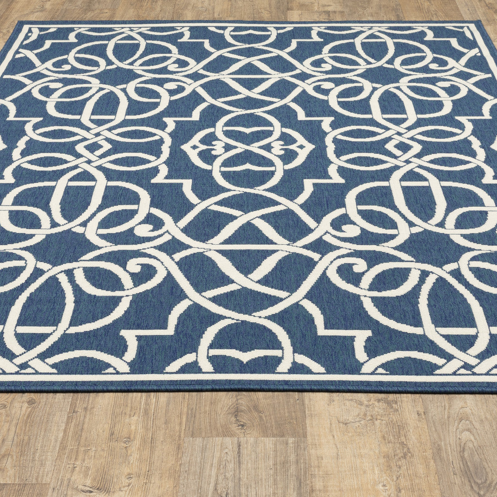 2' X 3' Blue and Ivory Geometric Stain Resistant Indoor Outdoor Area Rug