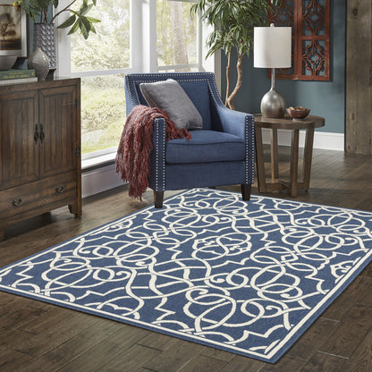 4' X 6' Blue and Ivory Geometric Stain Resistant Indoor Outdoor Area Rug