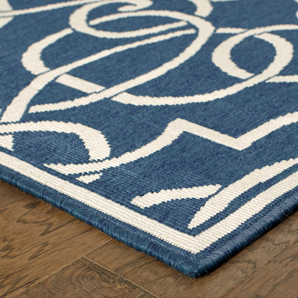 4' X 6' Blue and Ivory Geometric Stain Resistant Indoor Outdoor Area Rug